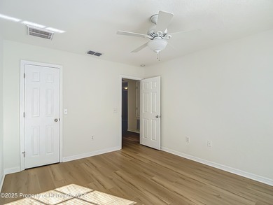 Welcome to this beautifully updated 4-bedroom, 3-bath home on Southern Woods Golf Club in Florida - for sale on GolfHomes.com, golf home, golf lot