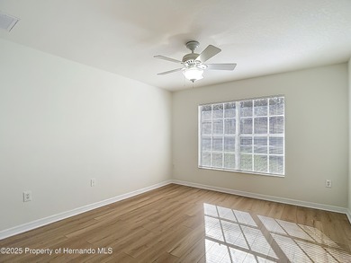 Welcome to this beautifully updated 4-bedroom, 3-bath home on Southern Woods Golf Club in Florida - for sale on GolfHomes.com, golf home, golf lot