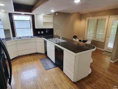 This spacious, nearly 4,700 sq ft house is located in a quiet on Alvamar Orchards in Kansas - for sale on GolfHomes.com, golf home, golf lot