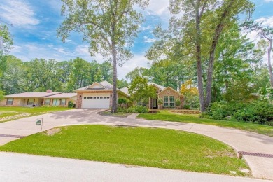 Welcome to your dream home in the charming Hideaway community! on Hide-A-Way Lake Golf Course in Texas - for sale on GolfHomes.com, golf home, golf lot