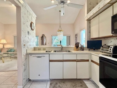 What a Beautiful Lake View this 2-Bedroom, 2-Bathroom Condo has! on Pine Tree Golf Club in Florida - for sale on GolfHomes.com, golf home, golf lot