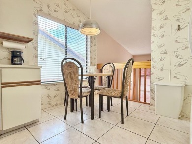 What a Beautiful Lake View this 2-Bedroom, 2-Bathroom Condo has! on Pine Tree Golf Club in Florida - for sale on GolfHomes.com, golf home, golf lot