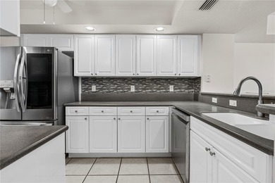 Experience coastal elegance in this impeccably finished on Harbour Village Golf and Yacht Club in Florida - for sale on GolfHomes.com, golf home, golf lot