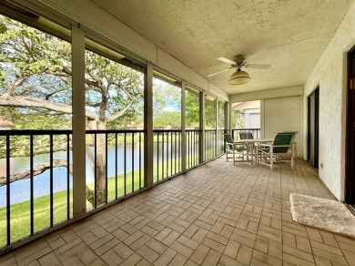 What a Beautiful Lake View this 2-Bedroom, 2-Bathroom Condo has! on Pine Tree Golf Club in Florida - for sale on GolfHomes.com, golf home, golf lot