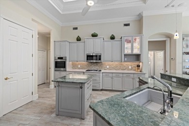 COMPLETELY RENOVATED WITH ALL NEW HURRICANE-RESISTANT WINDOWS on University Park Country Club in Florida - for sale on GolfHomes.com, golf home, golf lot