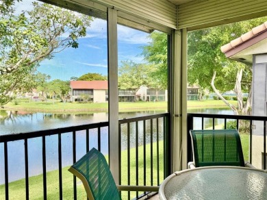 What a Beautiful Lake View this 2-Bedroom, 2-Bathroom Condo has! on Pine Tree Golf Club in Florida - for sale on GolfHomes.com, golf home, golf lot