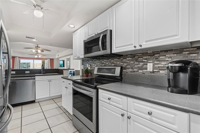 Experience coastal elegance in this impeccably finished on Harbour Village Golf and Yacht Club in Florida - for sale on GolfHomes.com, golf home, golf lot