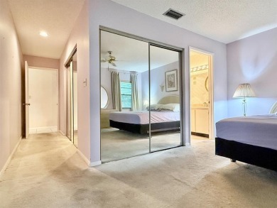 What a Beautiful Lake View this 2-Bedroom, 2-Bathroom Condo has! on Pine Tree Golf Club in Florida - for sale on GolfHomes.com, golf home, golf lot