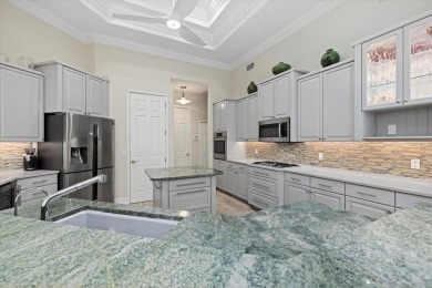 COMPLETELY RENOVATED WITH ALL NEW HURRICANE-RESISTANT WINDOWS on University Park Country Club in Florida - for sale on GolfHomes.com, golf home, golf lot