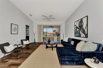 Refined elegance in Gondola Park. This second-floor residence on Capri Isle Golf Club in Florida - for sale on GolfHomes.com, golf home, golf lot