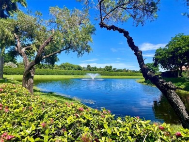 What a Beautiful Lake View this 2-Bedroom, 2-Bathroom Condo has! on Pine Tree Golf Club in Florida - for sale on GolfHomes.com, golf home, golf lot