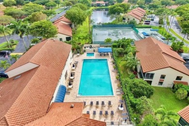 What a Beautiful Lake View this 2-Bedroom, 2-Bathroom Condo has! on Pine Tree Golf Club in Florida - for sale on GolfHomes.com, golf home, golf lot