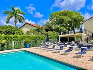 What a Beautiful Lake View this 2-Bedroom, 2-Bathroom Condo has! on Pine Tree Golf Club in Florida - for sale on GolfHomes.com, golf home, golf lot