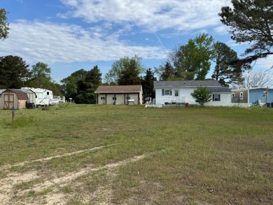 Clear and flat lot in Trails End.  Includes access to pool, dock on Captains Cove Golf and Yacht Club in Virginia - for sale on GolfHomes.com, golf home, golf lot