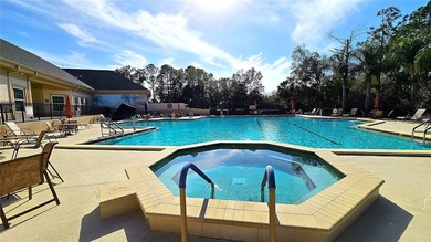 Enjoy maintenance-free living in this fully furnished 1,855 on Timber Greens Country Club in Florida - for sale on GolfHomes.com, golf home, golf lot