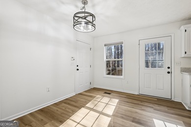 Welcome home to this cutie, updated 3-bedroom,2 bath home that on Turtle Cove Golf Course in Georgia - for sale on GolfHomes.com, golf home, golf lot