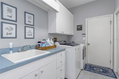 Welcome to this bright and inviting 5-bedroom, 3-bath, and 3-car on Hunters Green Country Club in Florida - for sale on GolfHomes.com, golf home, golf lot