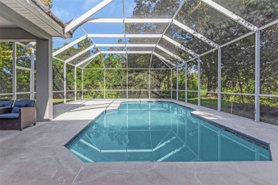 Welcome to this bright and inviting 5-bedroom, 3-bath, and 3-car on Hunters Green Country Club in Florida - for sale on GolfHomes.com, golf home, golf lot