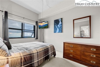 High atop Sugar Mountain, this 2-bedroom, 2-bath condo at on Sugar Mountain Golf Course in North Carolina - for sale on GolfHomes.com, golf home, golf lot
