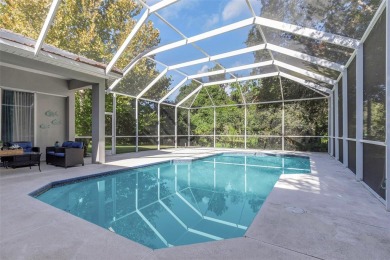 Welcome to this bright and inviting 5-bedroom, 3-bath, and 3-car on Hunters Green Country Club in Florida - for sale on GolfHomes.com, golf home, golf lot