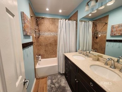 Panoramic views and an unbeatable location highlight this 6 bed on Lake Powell National Golf Course in Arizona - for sale on GolfHomes.com, golf home, golf lot