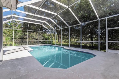 Welcome to this bright and inviting 5-bedroom, 3-bath, and 3-car on Hunters Green Country Club in Florida - for sale on GolfHomes.com, golf home, golf lot