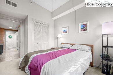 High atop Sugar Mountain, this 2-bedroom, 2-bath condo at on Sugar Mountain Golf Course in North Carolina - for sale on GolfHomes.com, golf home, golf lot