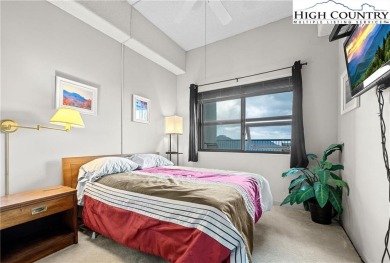 High atop Sugar Mountain, this 2-bedroom, 2-bath condo at on Sugar Mountain Golf Course in North Carolina - for sale on GolfHomes.com, golf home, golf lot