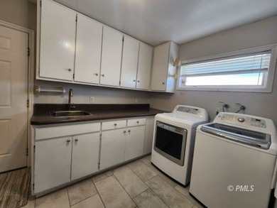 Panoramic views and an unbeatable location highlight this 6 bed on Lake Powell National Golf Course in Arizona - for sale on GolfHomes.com, golf home, golf lot