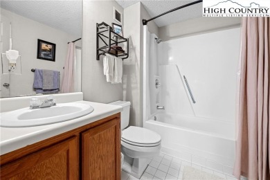High atop Sugar Mountain, this 2-bedroom, 2-bath condo at on Sugar Mountain Golf Course in North Carolina - for sale on GolfHomes.com, golf home, golf lot