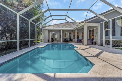 Welcome to this bright and inviting 5-bedroom, 3-bath, and 3-car on Hunters Green Country Club in Florida - for sale on GolfHomes.com, golf home, golf lot