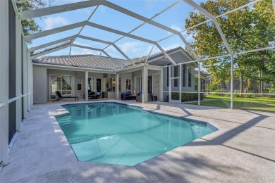 Welcome to this bright and inviting 5-bedroom, 3-bath, and 3-car on Hunters Green Country Club in Florida - for sale on GolfHomes.com, golf home, golf lot