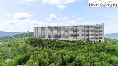 High atop Sugar Mountain, this 2-bedroom, 2-bath condo at on Sugar Mountain Golf Course in North Carolina - for sale on GolfHomes.com, golf home, golf lot