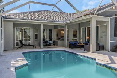 Welcome to this bright and inviting 5-bedroom, 3-bath, and 3-car on Hunters Green Country Club in Florida - for sale on GolfHomes.com, golf home, golf lot