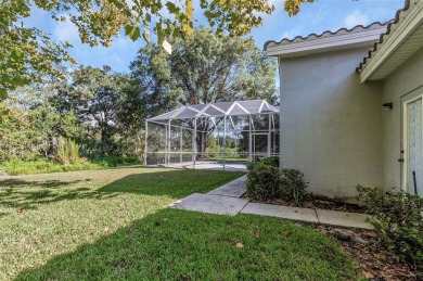 Welcome to this bright and inviting 5-bedroom, 3-bath, and 3-car on Hunters Green Country Club in Florida - for sale on GolfHomes.com, golf home, golf lot