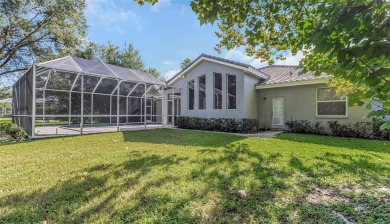 Welcome to this bright and inviting 5-bedroom, 3-bath, and 3-car on Hunters Green Country Club in Florida - for sale on GolfHomes.com, golf home, golf lot