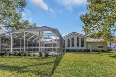 Welcome to this bright and inviting 5-bedroom, 3-bath, and 3-car on Hunters Green Country Club in Florida - for sale on GolfHomes.com, golf home, golf lot