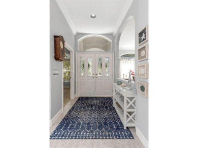 Welcome to this bright and inviting 5-bedroom, 3-bath, and 3-car on Hunters Green Country Club in Florida - for sale on GolfHomes.com, golf home, golf lot