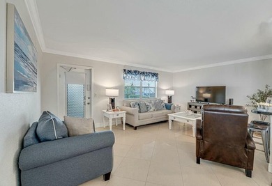 Beautiful 1st floor corner unit overlooking the golf course on Kings Point Golf - Executive in Florida - for sale on GolfHomes.com, golf home, golf lot