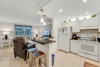 Welcome to this beautifully updated corner unit on 1st-floor on Kings Point Golf - Executive in Florida - for sale on GolfHomes.com, golf home, golf lot