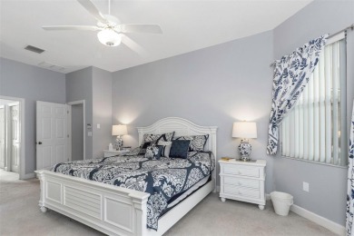 Welcome to this bright and inviting 5-bedroom, 3-bath, and 3-car on Hunters Green Country Club in Florida - for sale on GolfHomes.com, golf home, golf lot