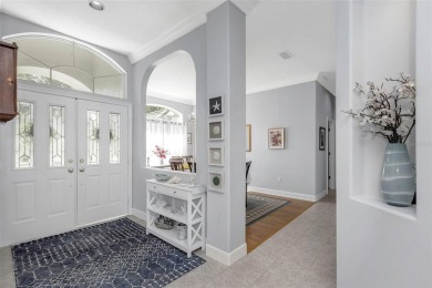 Welcome to this bright and inviting 5-bedroom, 3-bath, and 3-car on Hunters Green Country Club in Florida - for sale on GolfHomes.com, golf home, golf lot