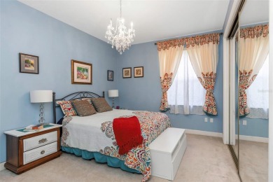 Welcome to this bright and inviting 5-bedroom, 3-bath, and 3-car on Hunters Green Country Club in Florida - for sale on GolfHomes.com, golf home, golf lot