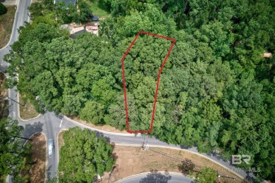 This beautiful wooded lot of approximately 0.476 acres is your on Lake Forest Yacht and Country Club in Alabama - for sale on GolfHomes.com, golf home, golf lot