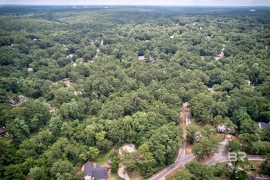 This beautiful wooded lot of approximately 0.476 acres is your on Lake Forest Yacht and Country Club in Alabama - for sale on GolfHomes.com, golf home, golf lot