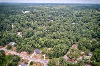 This beautiful wooded lot of approximately 0.476 acres is your on Lake Forest Yacht and Country Club in Alabama - for sale on GolfHomes.com, golf home, golf lot