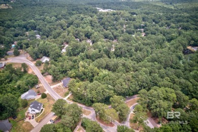 This beautiful wooded lot of approximately 0.476 acres is your on Lake Forest Yacht and Country Club in Alabama - for sale on GolfHomes.com, golf home, golf lot