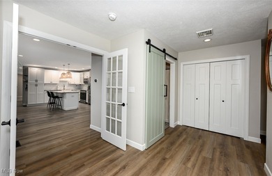 This beautifully designed and updated ranch residence features 2 on Ohio Prestwick Country Club in Ohio - for sale on GolfHomes.com, golf home, golf lot