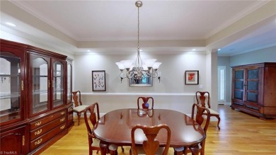 Enter the front door to view the beautiful great room w/stone on Salem Glen Country Club in North Carolina - for sale on GolfHomes.com, golf home, golf lot