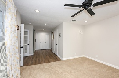 This beautifully designed and updated ranch residence features 2 on Ohio Prestwick Country Club in Ohio - for sale on GolfHomes.com, golf home, golf lot